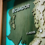 Laser engraved topical map of Ecuador with Llagos in the middle