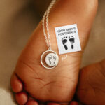 Silver laser engraved footprint pendant