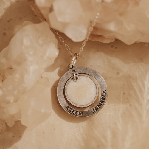 Silver breastmilk filled pendant