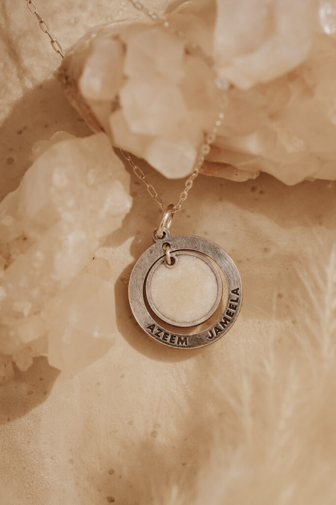 Silver breastmilk filled pendant