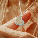 Silver heart shaped breastmilk filled pendants