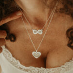 Silver heart shaped and infinity shaped breastmilk filled pendants