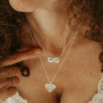 Silver infinity and heart shaped breastmilk filled pendants