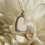 Silver heart shaped breastmilk filled pendant