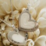 Silver heart shaped breastmilk filled pendants