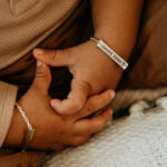 Two silver laser engraved baby bracelets