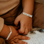 Two silver laser engraved baby bracelets