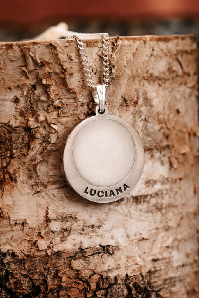 Engraved silver breastmilk filled pendant