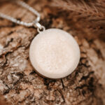 Silver breastmilk filled circle pendant