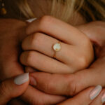 Gold breastmilk filled ring with gold flakes