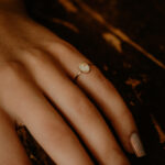 Gold oval breastmilk filled ring