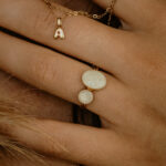 Gold double oval breastmilk filled ring