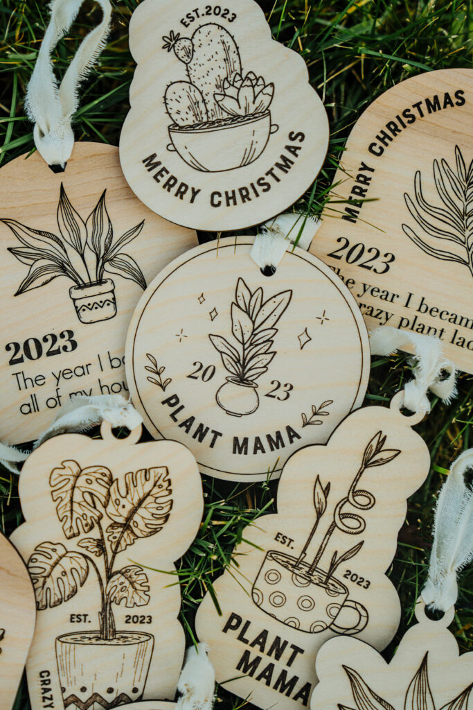 Wooden Christmas ornaments with laser engraved plants