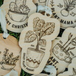 Wooden Christmas ornaments with laser engraved plants