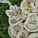 Wooden Christmas ornaments with laser engraved plants